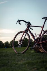 a bicycle parked on grass